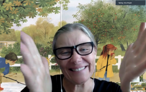 helen clapping with picture book virtual background