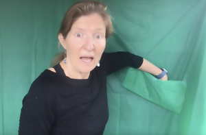 kira with green screen pocket for virtual speech therapy